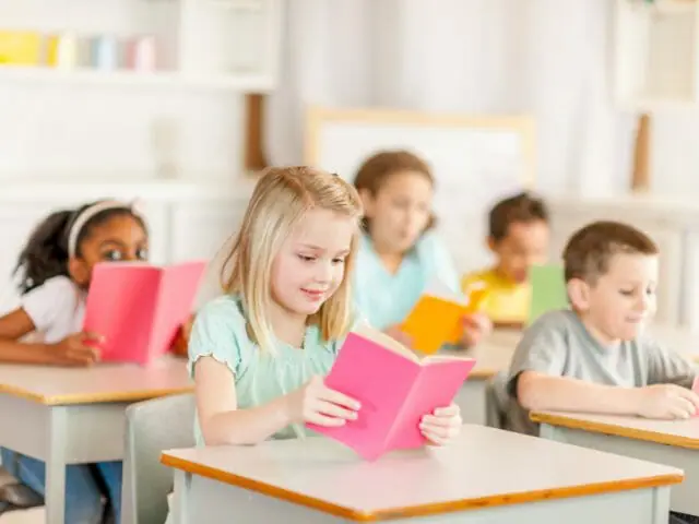 1st graders reading in class