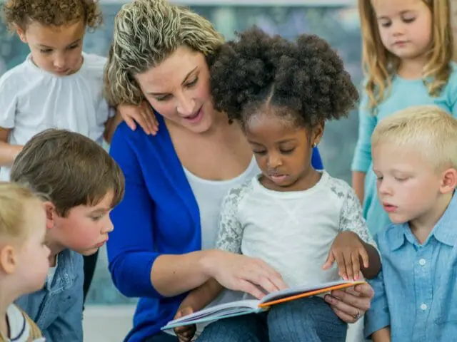 teacher and students reading